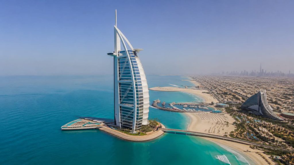 Which Dubai Beach Should You Actually Choose 1 Aerial view of the Burj Al Arab hotel rising from the Jumeirah coastline